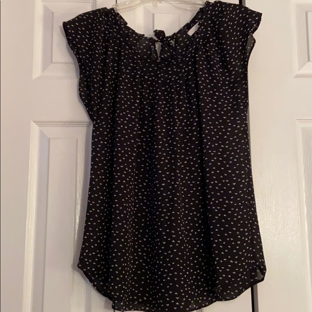 Black blouse with small white flowers